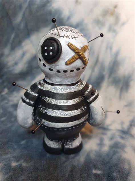 Pugsley Addams' Voodoo Doll: A Creepy Connection to the Supernatural